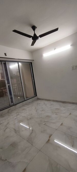 Room in 2 BHK Apartment at Kalpataru Immensa D, Kolshet Road – for Sale