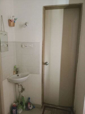 Bathroom in 1 BHK Apartment at Arihant Venkateshwara Green City, Hadapsar – for Rent