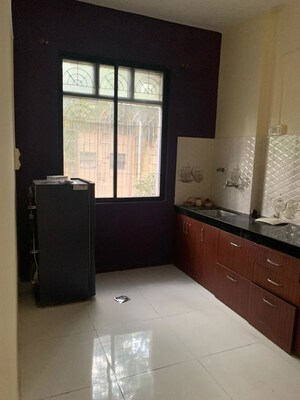 Kitchen in 3 BHK Apartment at Gananjay Society, Kothrud – for Rent