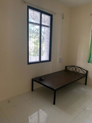 Bedroom in 3 BHK Apartment at Gananjay Society, Kothrud – for Rent