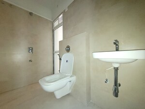 Bathroom in 1 BHK Apartment at Puranik City Reserva, Ghodbunder Road – for Rent