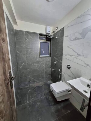 Bathroom in 2 BHK Apartment at Prescon Midtown Bay, Mahim West – for Rent
