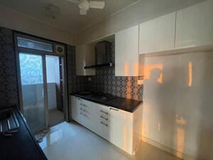 Kitchen in 2 BHK Apartment at Omkar Veda Exclusive, Parel – for Rent