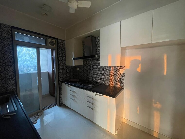 Kitchen, omkar-veda-exclusive 2 Bedroom 850 Sq.Ft. Apartment In Parel Mumbai 10462592