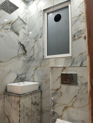 Bathroom in 3 BHK Builder Floor at Khirki Extension – for Sale