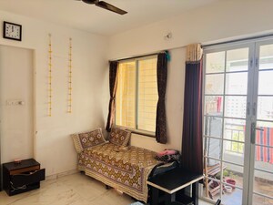 Living Room in 1 BHK Apartment at Kishor Platinum Towers, Wakad – for Rent