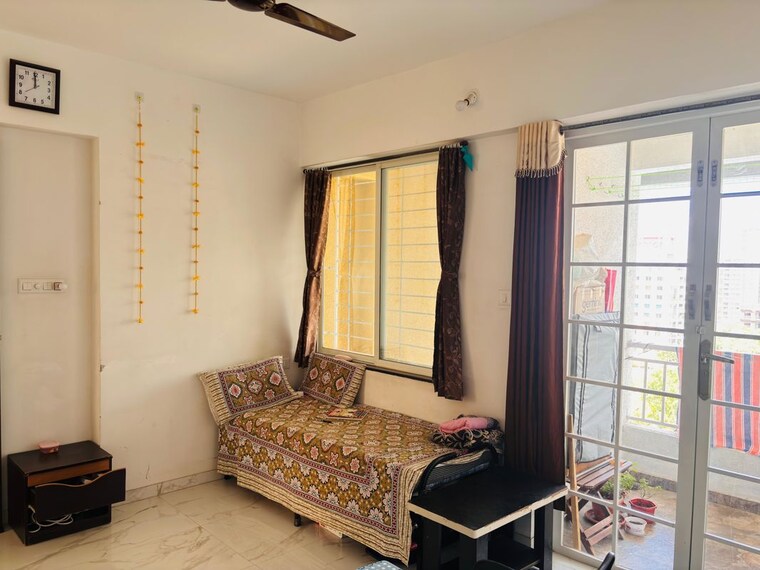 Living Room, kishor-platinum-towers 1 Bedroom 700 Sq.Ft. Apartment In Wakad Pune 10462733