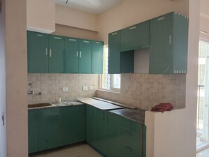Kitchen in 2 BHK Apartment at Amrapali Dream Valley – for Rent