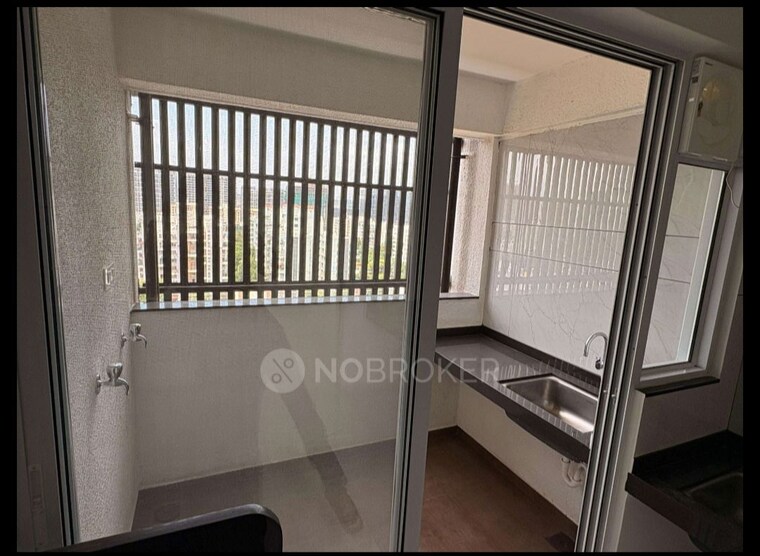 Kitchen, unicons-nirmitee-echinus-court 2 Bedroom 850 Sq.Ft. Apartment In Balewadi Pune 10462723