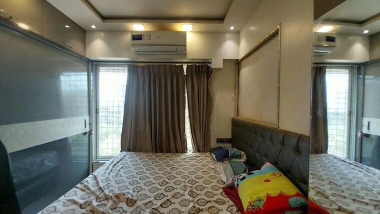 Bedroom, sky-view-chs 3 Bedroom 780 Sq.Ft. Apartment In Kurla Mumbai 10462752