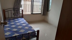 Bedroom in 2 BHK Apartment at Kumar Palaash A, Wadgaon Sheri – for Rent