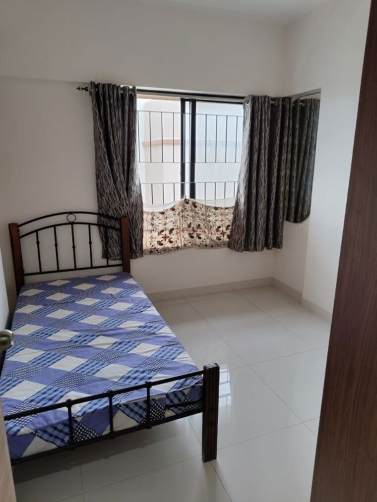 Bedroom, kumar-palaash-a 2 Bedroom 850 Sq.Ft. Apartment In Wadgaon Sheri Pune 10462899