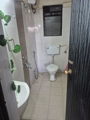 Bathroom in 2 BHK Apartment at Kamgar Putala Vasahat – for Rent