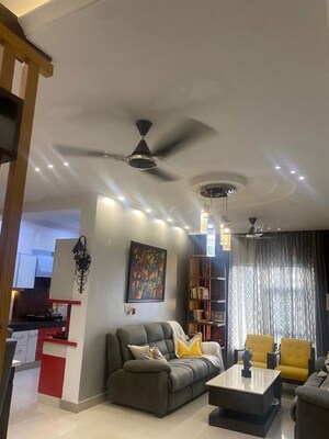 Living Room in 3.5 BHK Apartment at Paramount Floraville, Sector 137 – for Sale