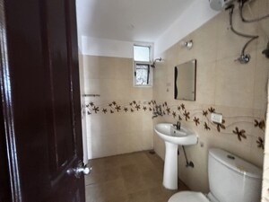 Bathroom in 2 BHK Apartment at Prateek Wisteria, Sector 77 – for Sale
