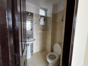 Bathroom in 2 BHK Apartment at Prateek Wisteria, Sector 77 – for Sale