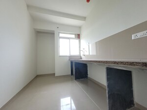 Kitchen in 2 BHK Apartment at Puranik City Reserva, Ghodbunder Road – for Rent