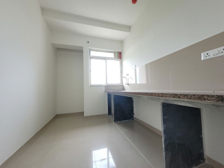 Kitchen, puranik-city-reserva 2 Bedroom 850 Sq.Ft. Apartment In Ghodbunder Road Thane 10463257