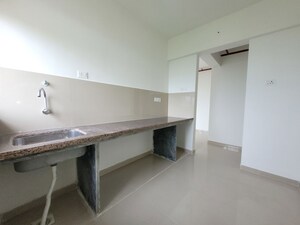 Kitchen in 2 BHK Apartment at Puranik City Reserva, Ghodbunder Road – for Rent