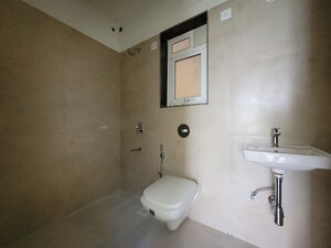 Bathroom in 2 BHK Apartment at Puranik City Reserva, Ghodbunder Road – for Rent