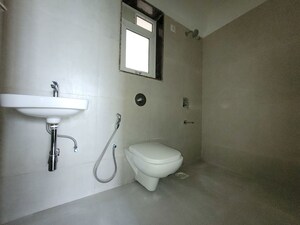 Bathroom in 2 BHK Apartment at Puranik City Reserva, Ghodbunder Road – for Rent