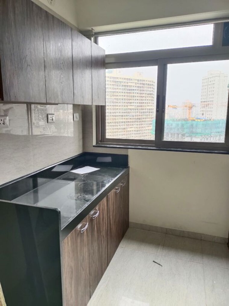 Kitchen, avant-hillway 1 Bedroom 409 Sq.Ft. Apartment In Goregaon East Mumbai 10463395
