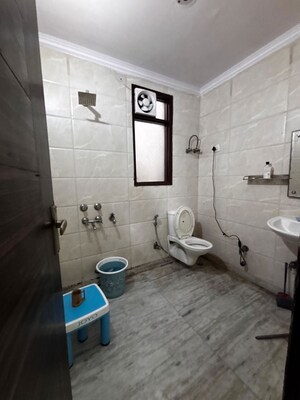 Bathroom in 2 BHK Builder Floor at Khirki Extension – for Rent