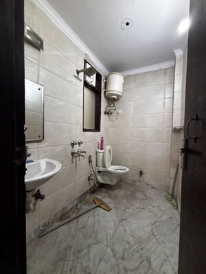 Bathroom in 2 BHK Builder Floor at Khirki Extension – for Rent