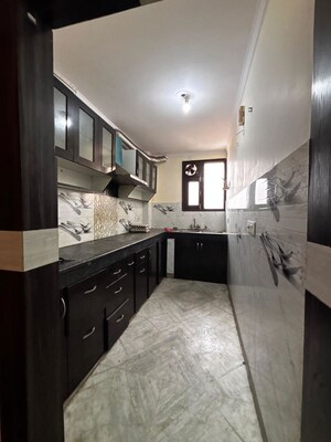 Kitchen in 2 BHK Builder Floor at Khirki Extension – for Rent