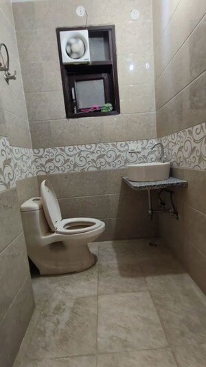 Bathroom in 3 BHK Builder Floor at Freedom Fighters Enclave – for Rent