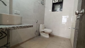 Bathroom in 3 BHK Builder Floor at Freedom Fighters Enclave – for Rent