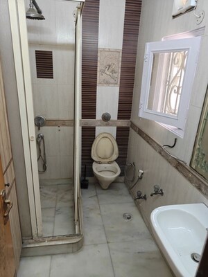 Bathroom in 4 BHK Builder Floor at Model Town – for Rent