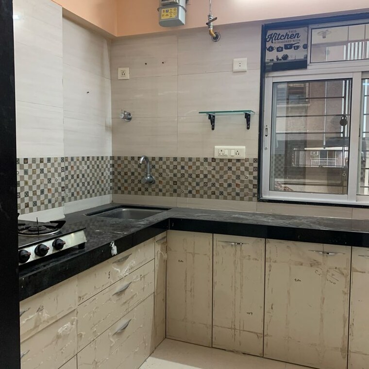 Kitchen, radheya-krishna-chhaya 2 Bedroom 562 Sq.Ft. Apartment In Eksar Mumbai 10463778