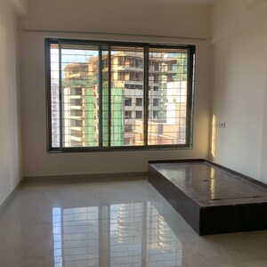 Room in 2 BHK Apartment at Sunshine Apartments Borivali, Eksar – for Rent
