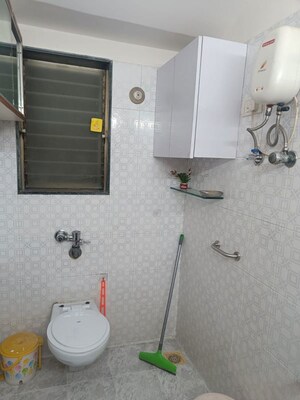 Bathroom in 1 BHK Apartment at Mota Mahal Apartment, Andheri West – for Rent
