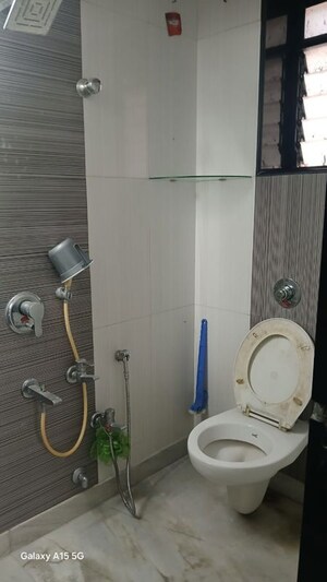 Bathroom in 1 BHK Apartment at Evershine Millennium Paradise, Kandivali East – for Rent