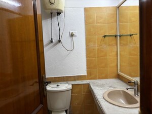 Bathroom in 3 BHK Apartment at ATS Green Village, Sector 93a – for Rent