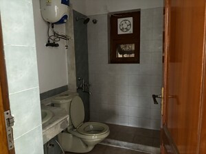 Bathroom in 3 BHK Apartment at ATS Green Village, Sector 93a – for Rent