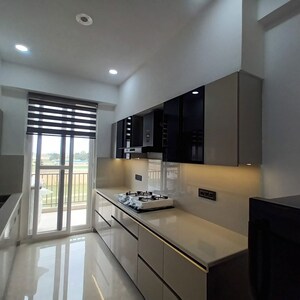Kitchen in 3 BHK Apartment at Artique Uptown Skylla, International Airport Road – for Rent
