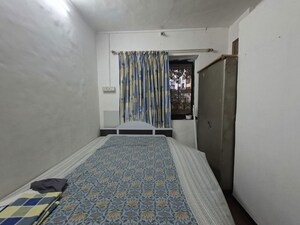 Bedroom in 2 BHK Apartment at Golders Green CHS, Borivali West – for Rent