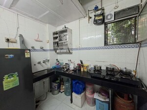 Kitchen in 2 BHK Apartment at Golders Green CHS, Borivali West – for Rent