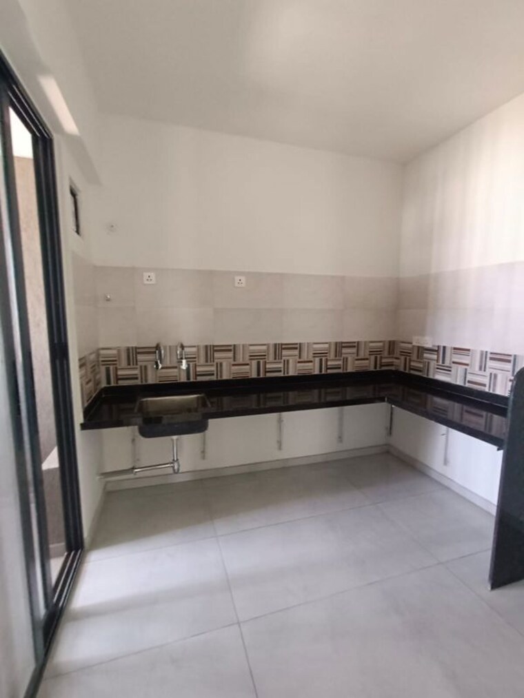 Kitchen, mantra-meraki 2 Bedroom 1000 Sq.Ft. Apartment In Akurdi Pune 10464224