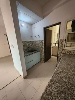 Building Lobby in 2 BHK Apartment at AWHO 8B, Vrindavan Yojna – for Rent