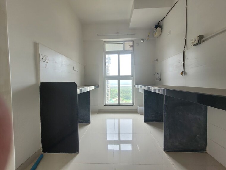 Kitchen, godrej-emerald 2 Bedroom 700 Sq.Ft. Apartment In Ghodbunder Road Thane 10464313