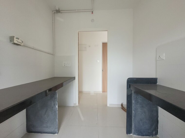 Kitchen, godrej-emerald 2 Bedroom 700 Sq.Ft. Apartment In Ghodbunder Road Thane 10464313