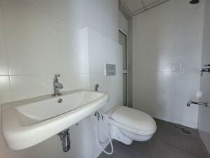 Bathroom in 2 BHK Apartment at Godrej Emerald, Ghodbunder Road – for Rent