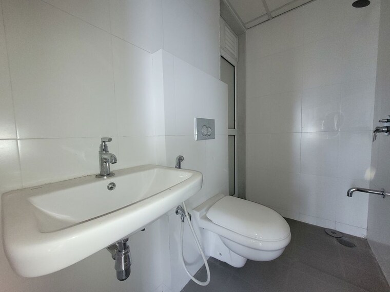 Bathroom, godrej-emerald 2 Bedroom 700 Sq.Ft. Apartment In Ghodbunder Road Thane 10464313