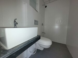 Bathroom in 2 BHK Apartment at Godrej Emerald, Ghodbunder Road – for Rent