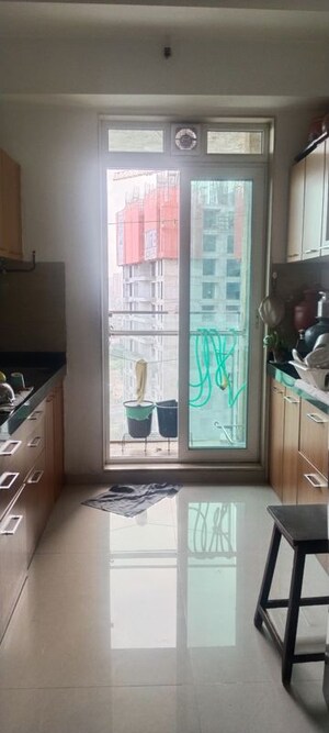 Kitchen in 3 BHK Apartment at Neelam Senroofs, Nahur East – for Rent