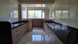 Kitchen in 3 BHK Apartment at Sanewadi – for Sale